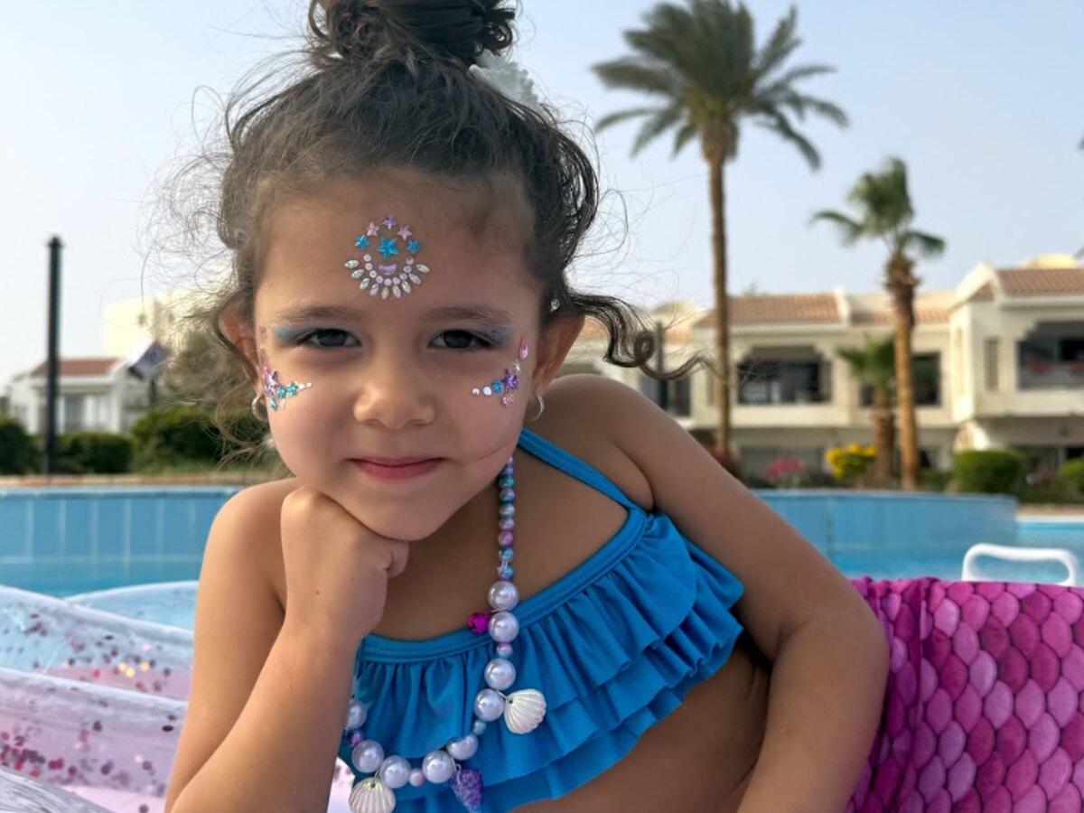 Young guest enjoying the mermaid photo experience